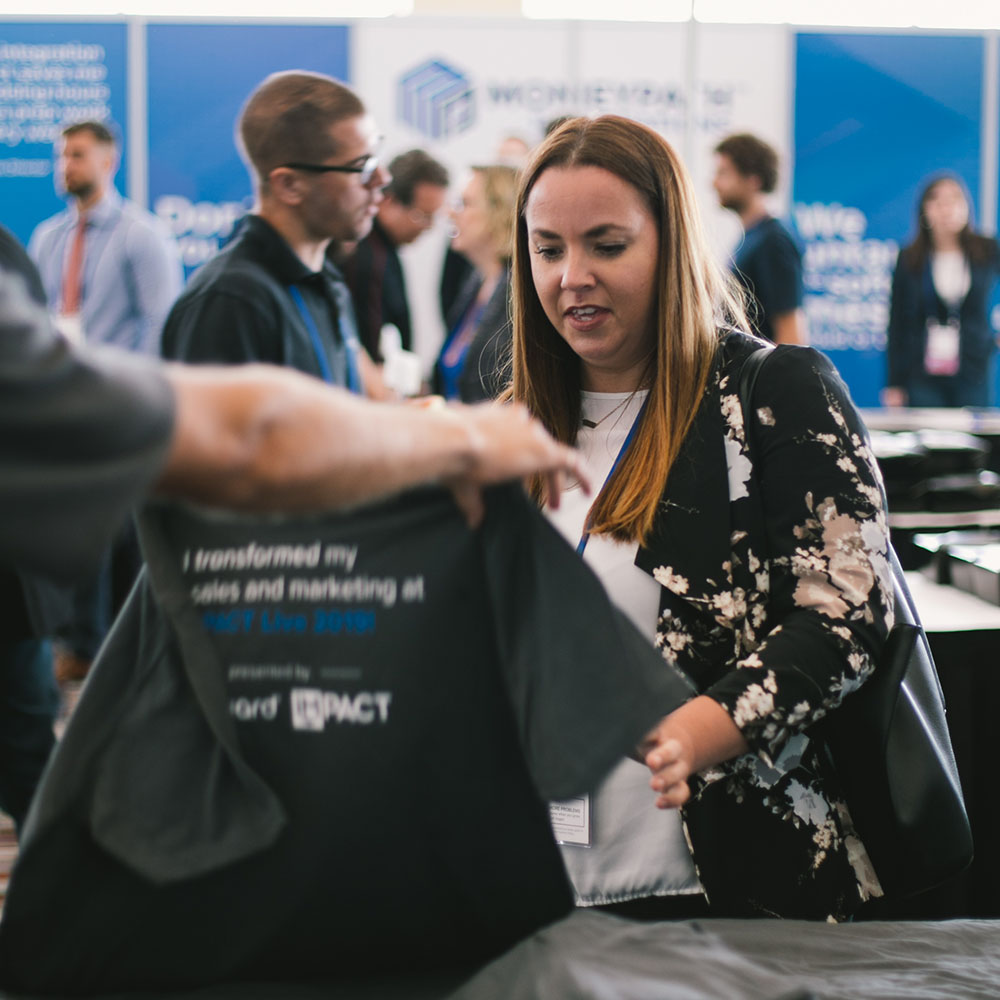 woman looking at shirt