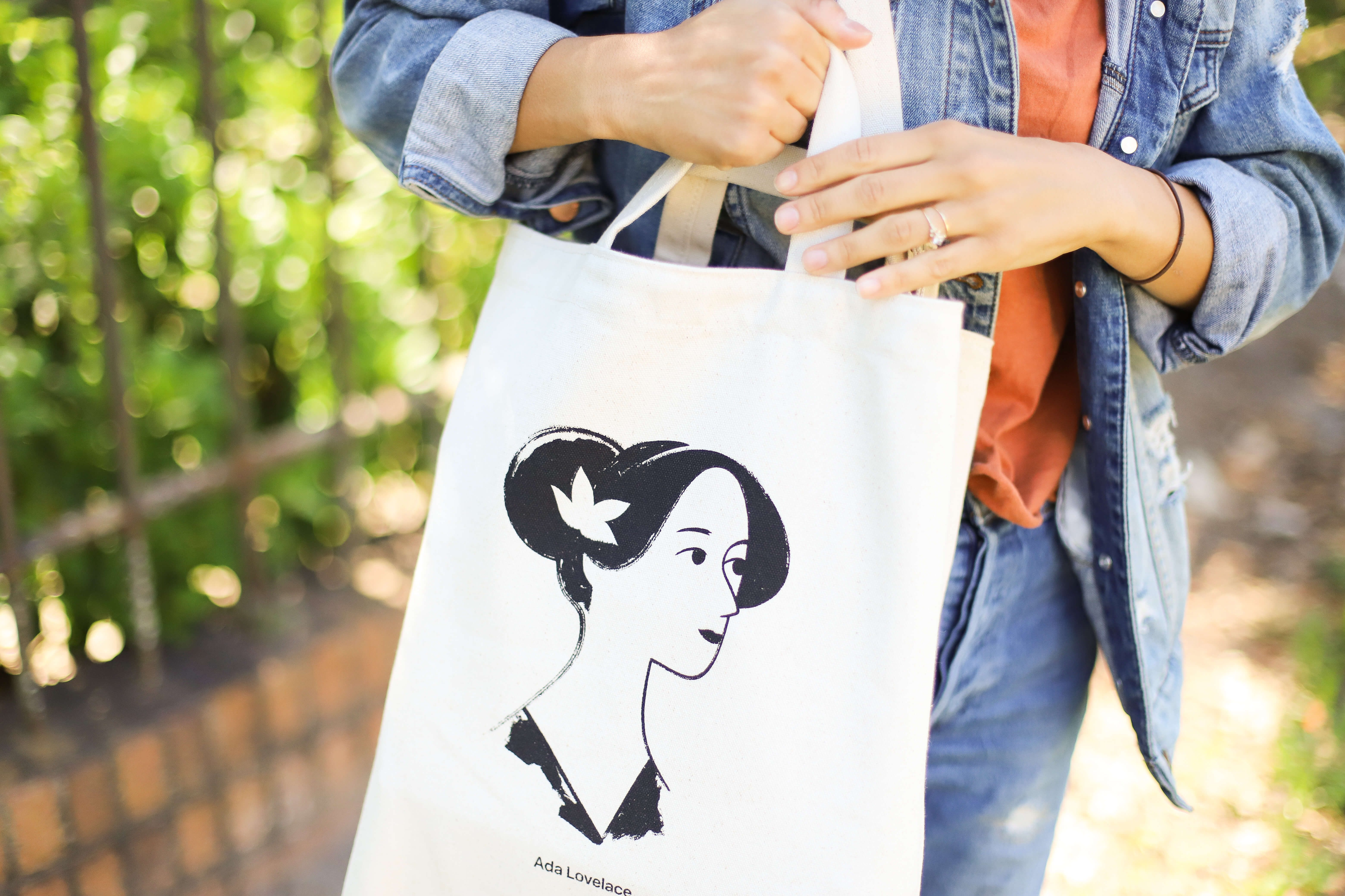 A custom tote bag in the wild—perfect for bringing to a 