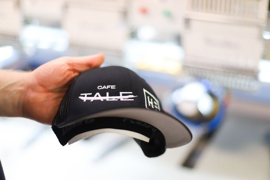 A finished hat with custom embroidered logo