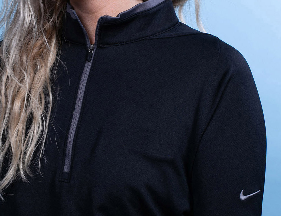 A Nike zip-up jacket with custom embroidery