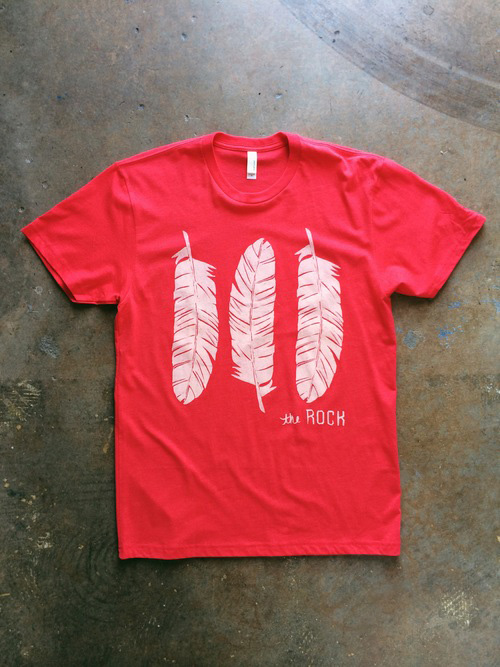 red shirt with white feathers printed