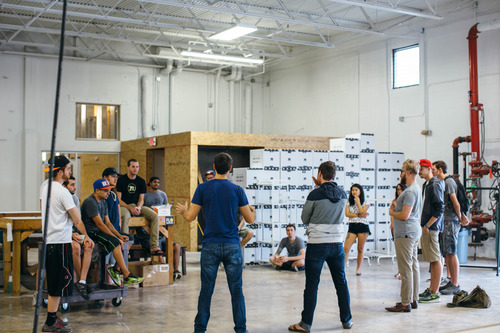 group of people standing in circle