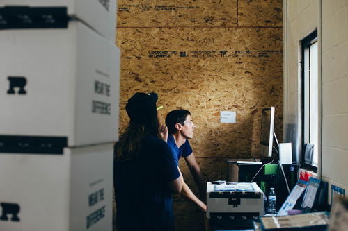 two people on a computer