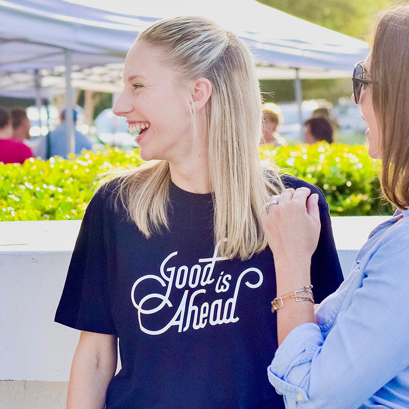 woman smiling and laughing