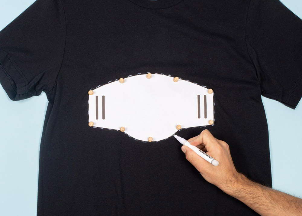 hand tracing stencil of face mask