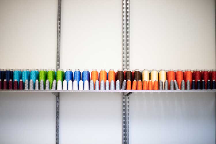 embroidery thread on a shelf