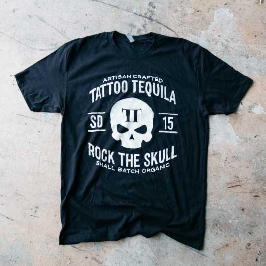 black shirt with white graphic flat laid