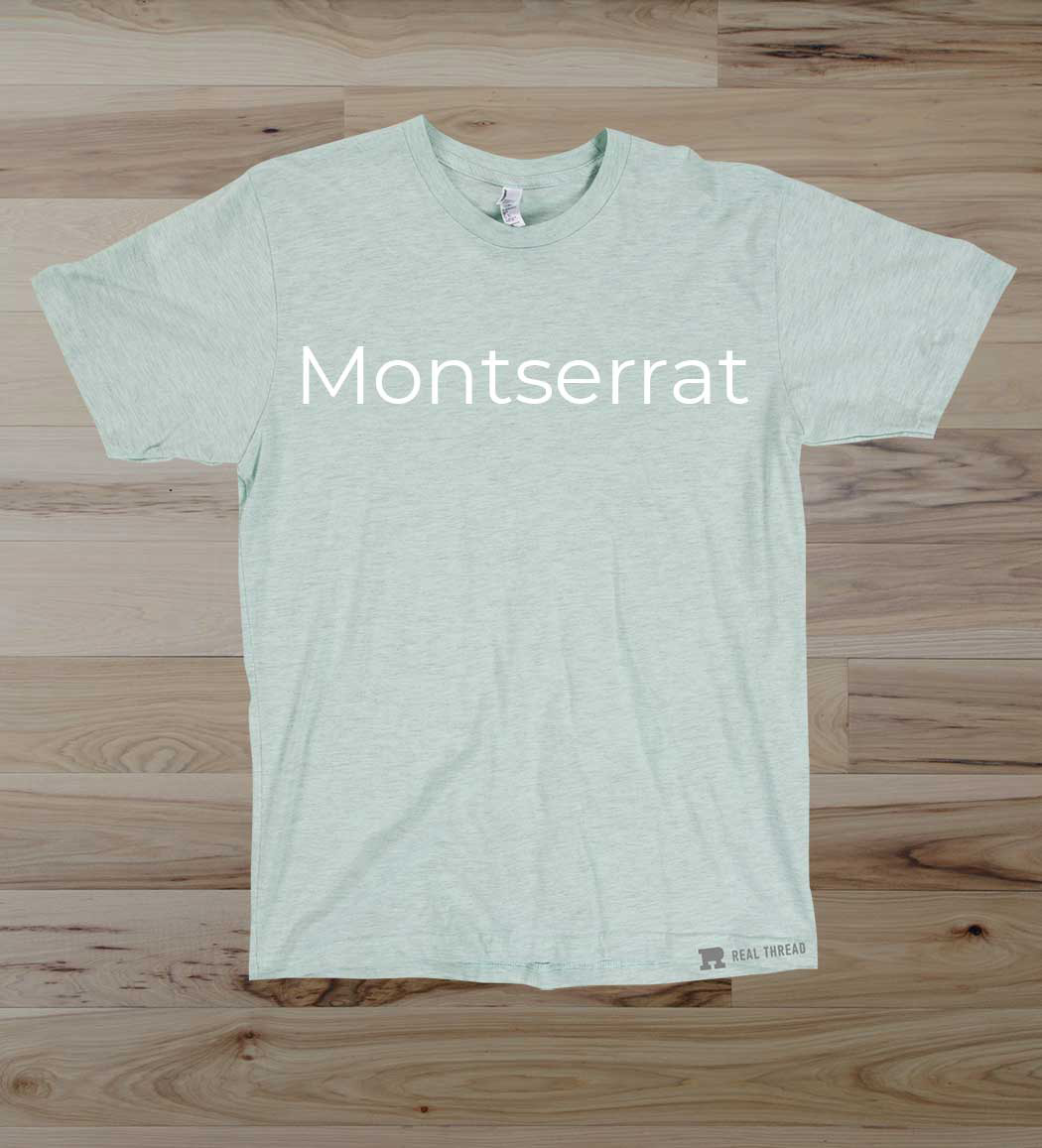 green shirt flat lay wood floor