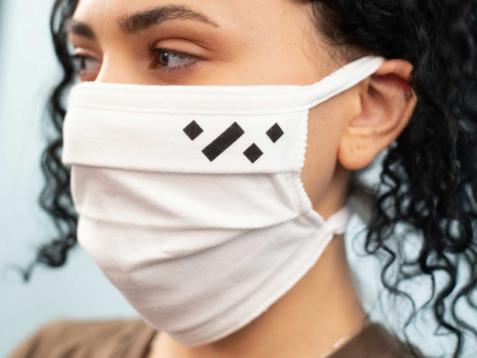 woman wearing white mask