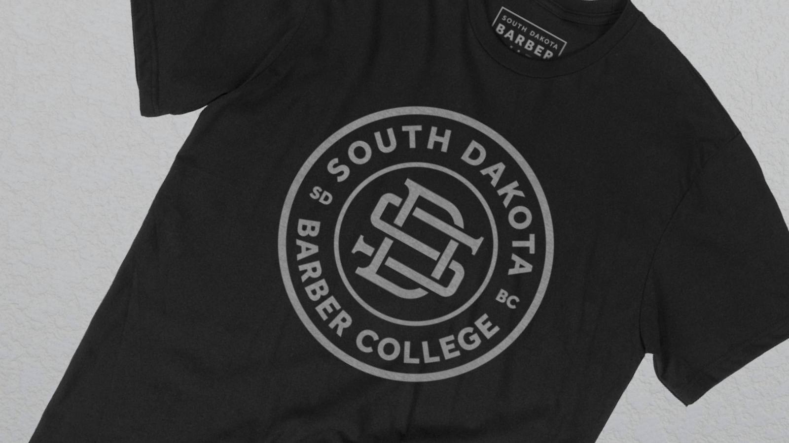 Black t-shirt with grey South Dakota college logo