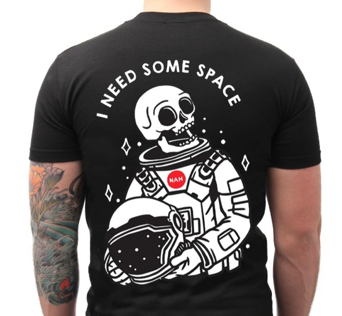 An American-Traditional skull design with "I need some space" written on it.