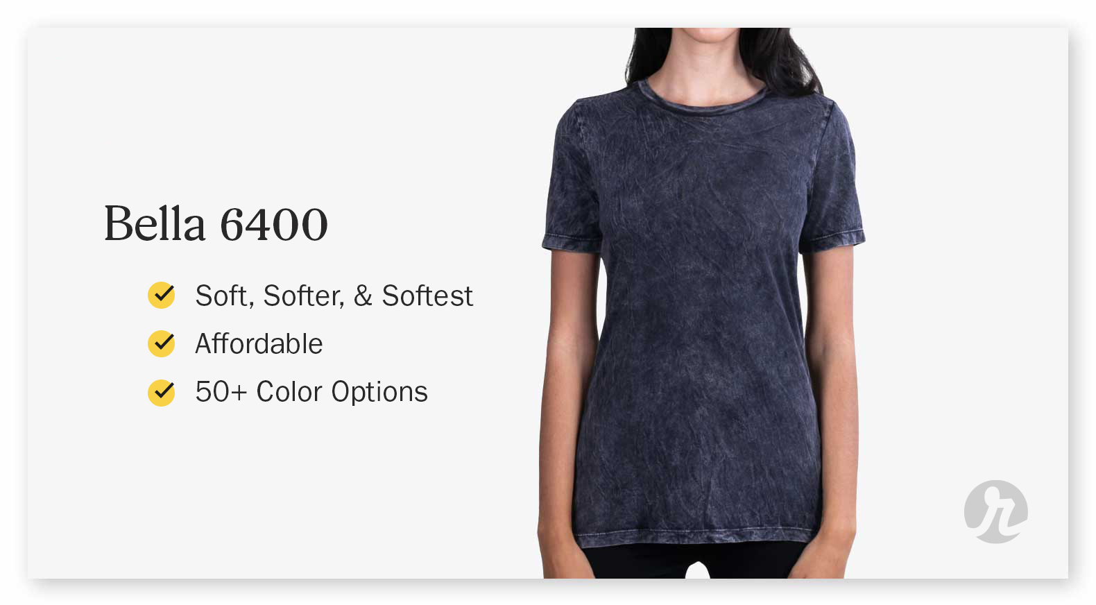 A woman wearing an acid-washed dark gray Bella+Canvas 6400