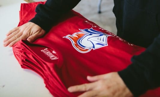 Custom apparel printing on red shirt