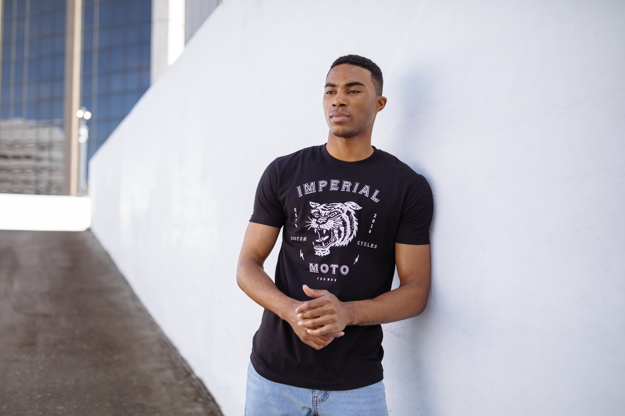 man with a shirt that shows an example of san serif typeface